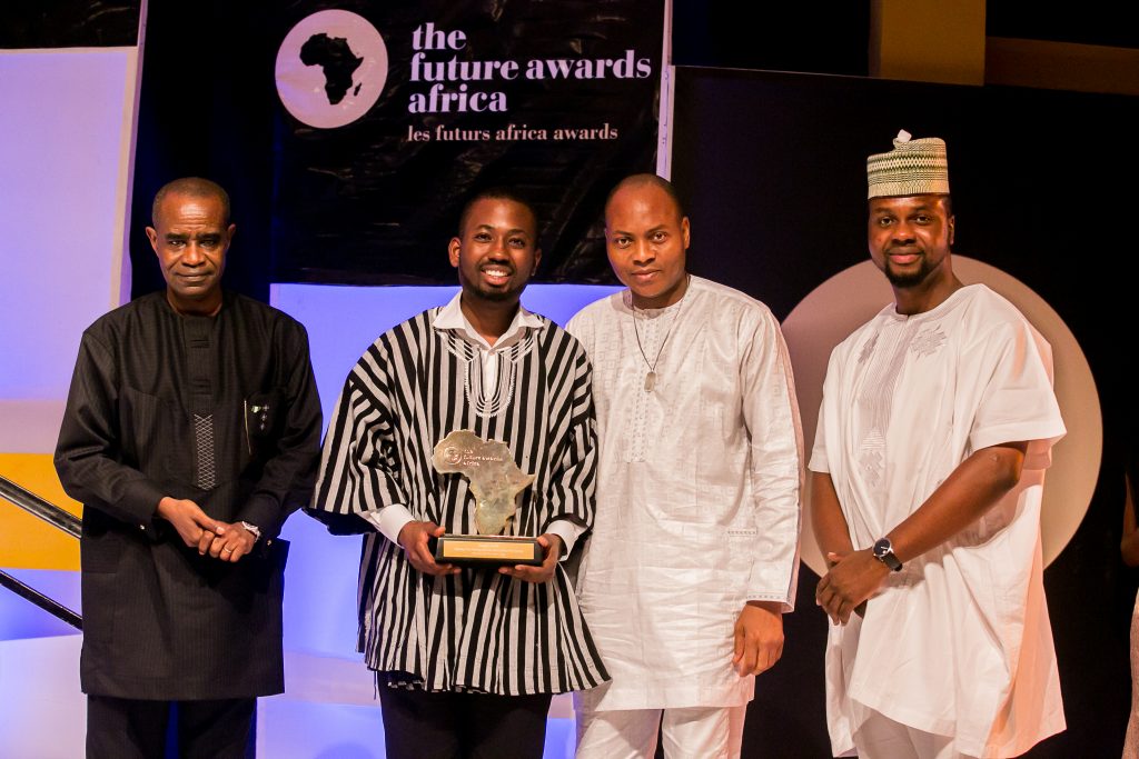 Winner TFAA2014 Young Person of the year Sangu Delle with Mr. Boni Haruna Minister for Youth Development Director from UBA at the event and Adebola Williams